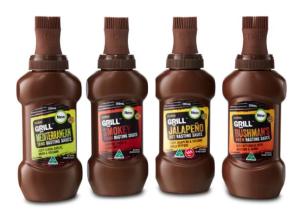 Coles' new barbecue basting sauce with built-in washable brushes.